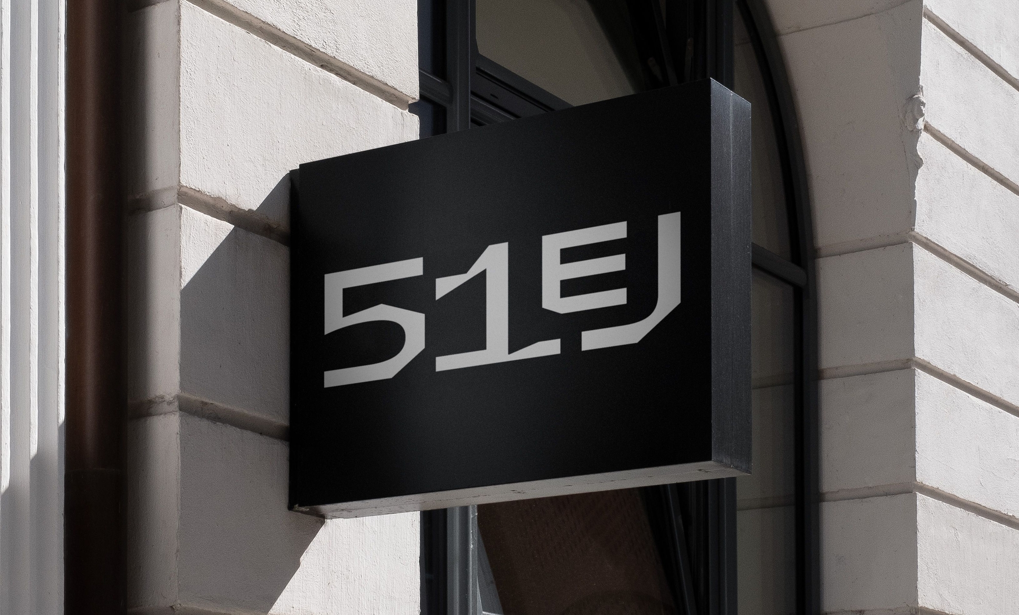 51 E John, Visual identity